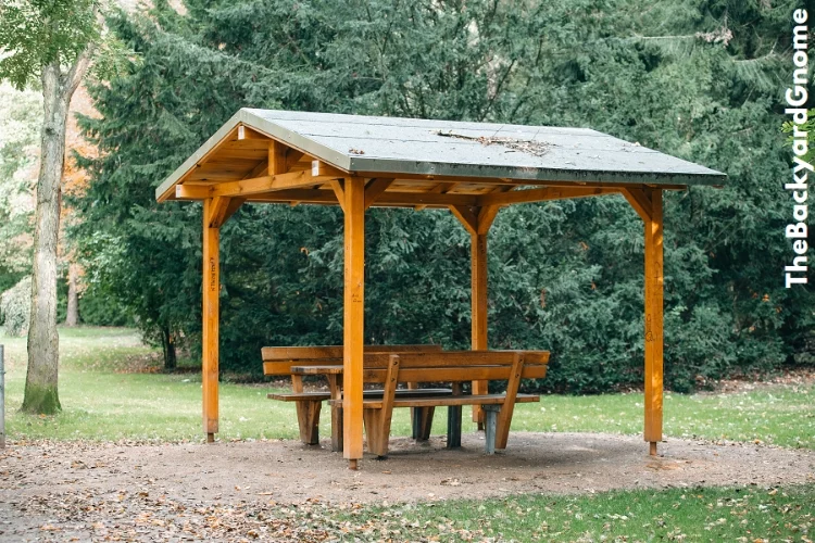 Covered seating area. Gazebo in a garden. Relax and unwind.